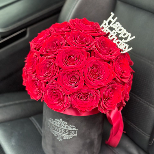 Fresh Red Roses in a Hatbox